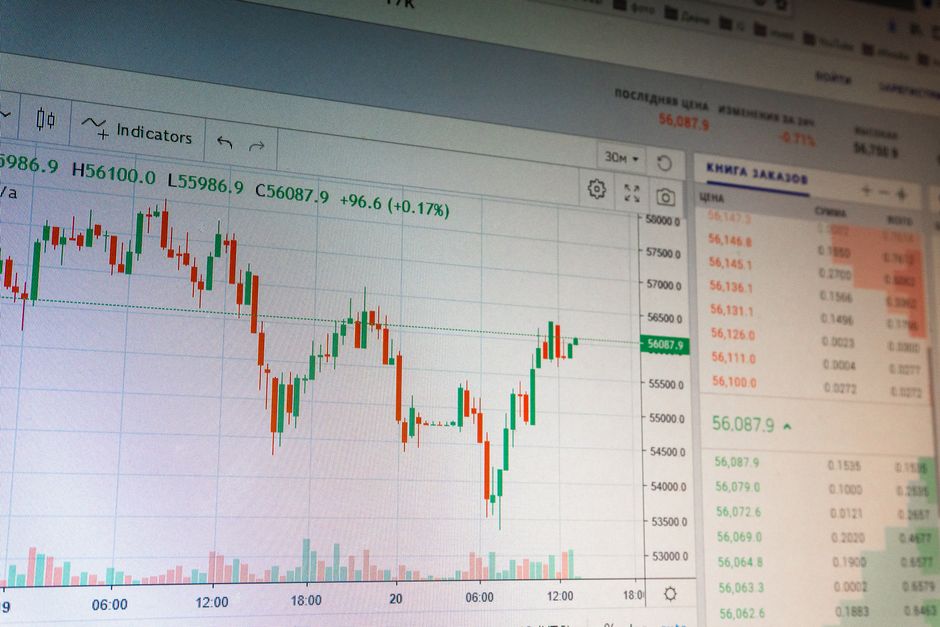 Sustainable ESG investing — Close-up of digital cryptocurrency market graph showing price fluctuations and trading data.